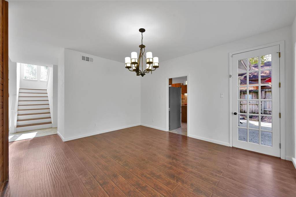Another view of the dining room, with entry door to patio and direct access to kitchen.