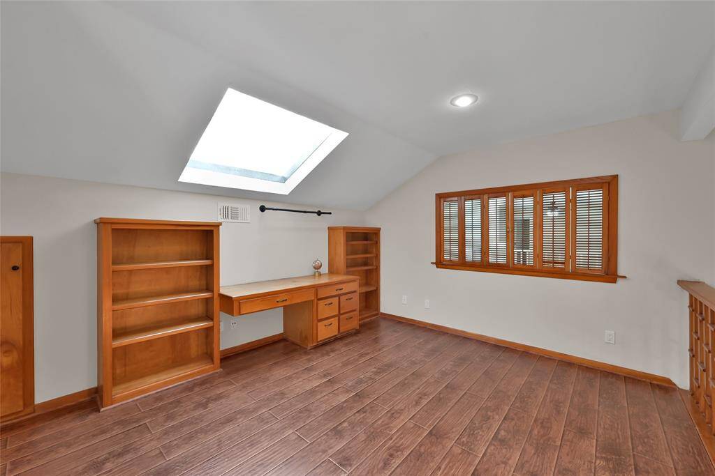 Upstairs private room offering additional living space for primary suite.  This room can be an office, art studio, workout room, man cave...the list is endless.
