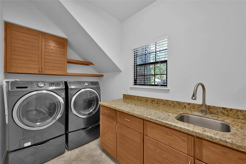 First floor laundry room near the kitchen.