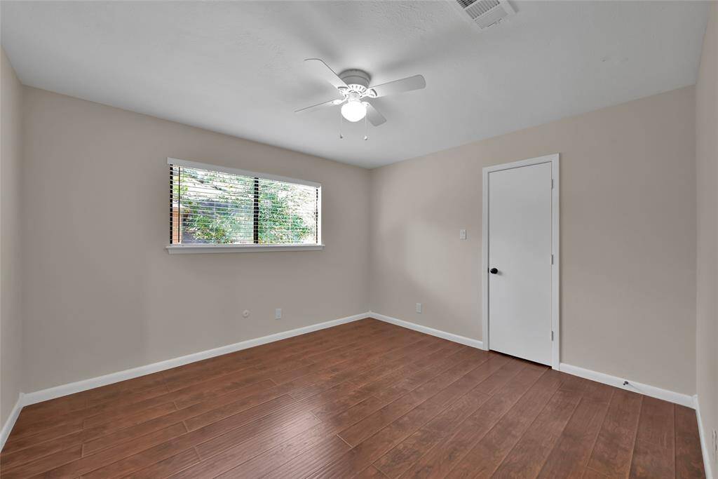 Upstairs secondary bedroom shares bathroom.  This room has a walk-in closet.