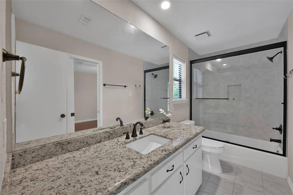 Additional upstairs secondary bathroom.