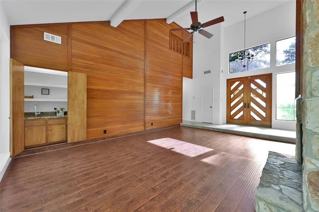 Enjoy a hidden wet bar hidden behind closed doors.