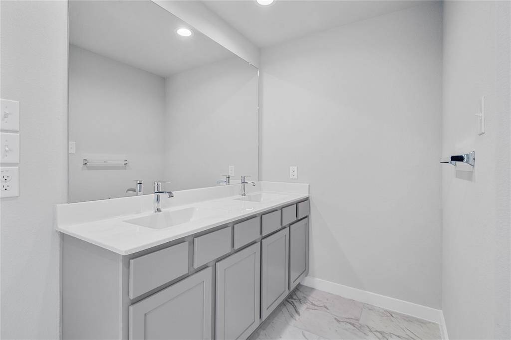 Gather the family and guests together in your lovely family room! Featuring high ceilings, recessed lighting, ceiling fan, custom paint, gorgeous wood look tile floors and large windows that provide plenty of natural lighting throughout the day.