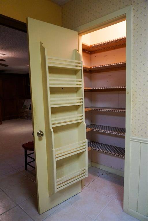 Pantry with built-in shelves.