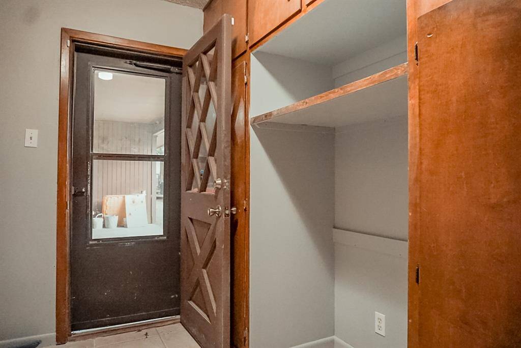 Back door that enters washing/utility room