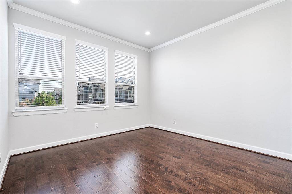 Dining room located on 2nd floor with balcony access. Powder bath is located between kitchen and dining with a large storage closet across.