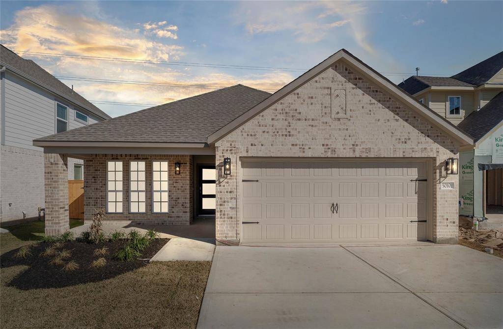 Welcome home to 5010 Blessing Drive located in Sunterra and zoned to Katy ISD.