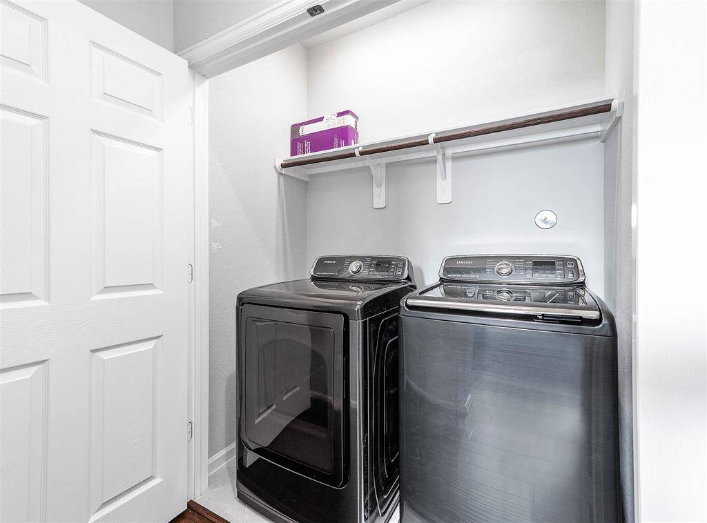 Utility room located on 3rd floor. Washer and dryer included. Located across is the 3rd floor storage closet and access to attic. You won't run out of storage space in this home!