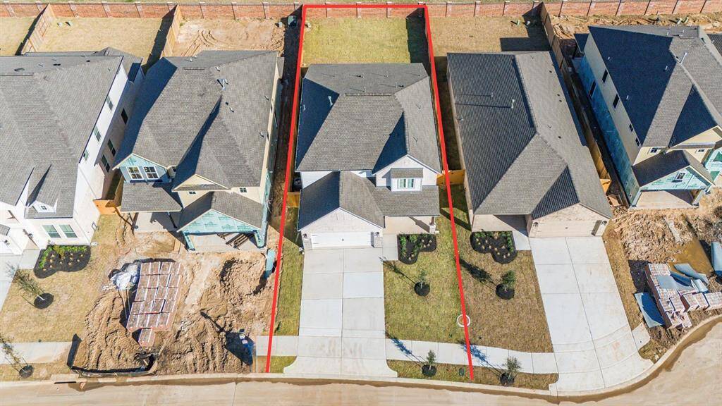 This home sits on a large lot with ample yard space in front and the back, lush landscaping and well-maintained yard!