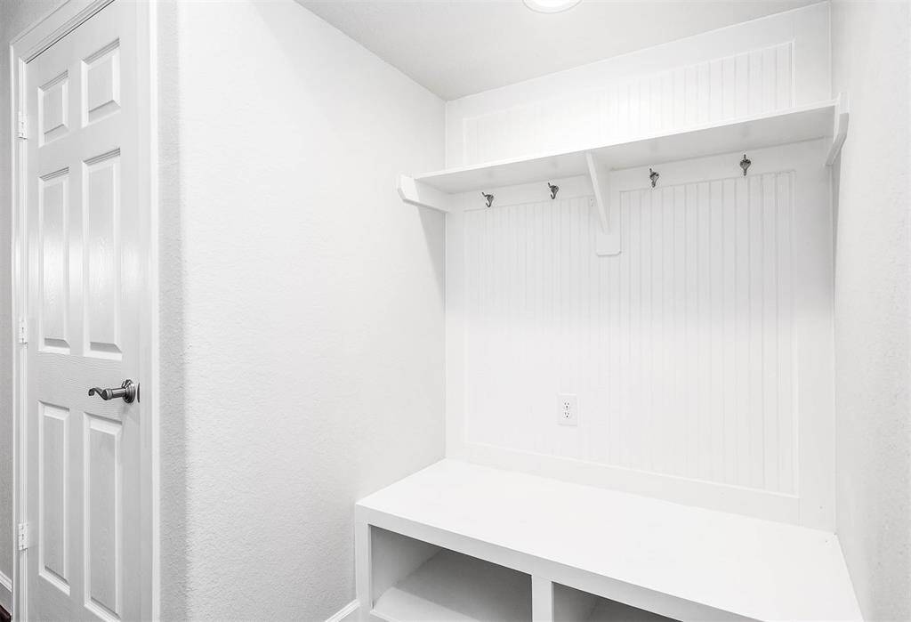 Convenient valet and large storage closet located located right across the garage door entry on the first floor.