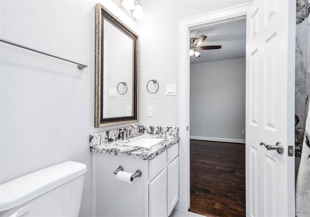 Full-sized bath adjoins the office and 3rd bedroom on first floor.