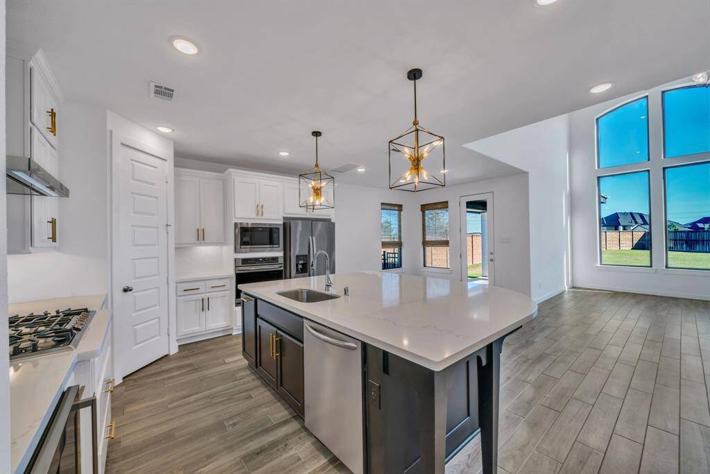 Kitchen features stainless steel appliances!