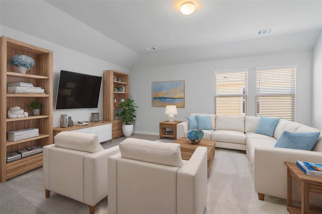 Come and unwind after a long day in this magnificent primary suite! This spacious room features plush carpet, warm paint, high ceilings with ceiling fan, and large windows with privacy blinds!