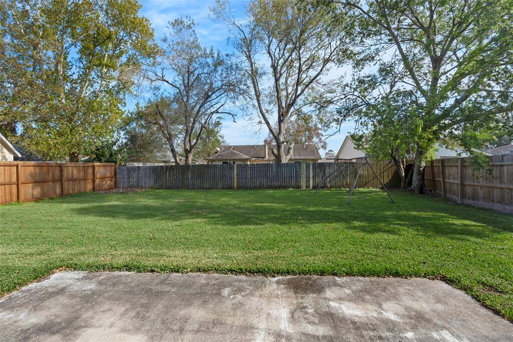 Let's explore the backyard! Lovely large concrete pad.