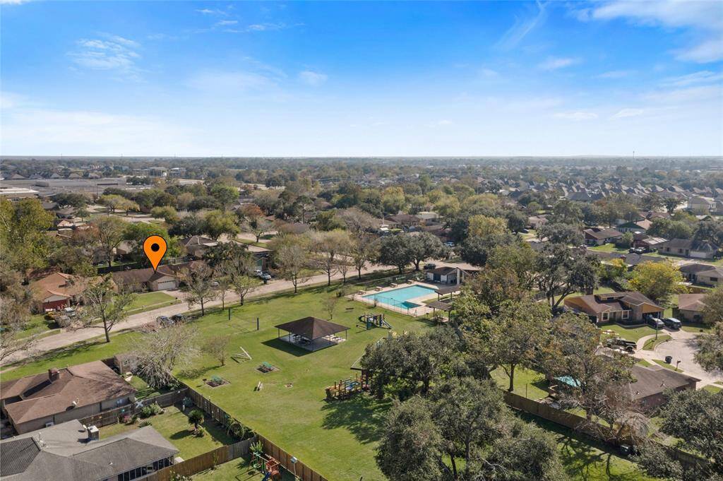 This home is located across the street from the neighborhood park and pool.
