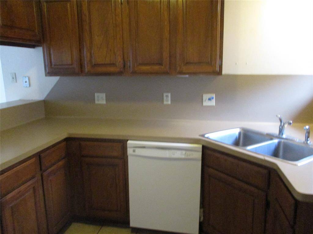 painted countertops with walnut woodwork cabinets. no fiber board here!