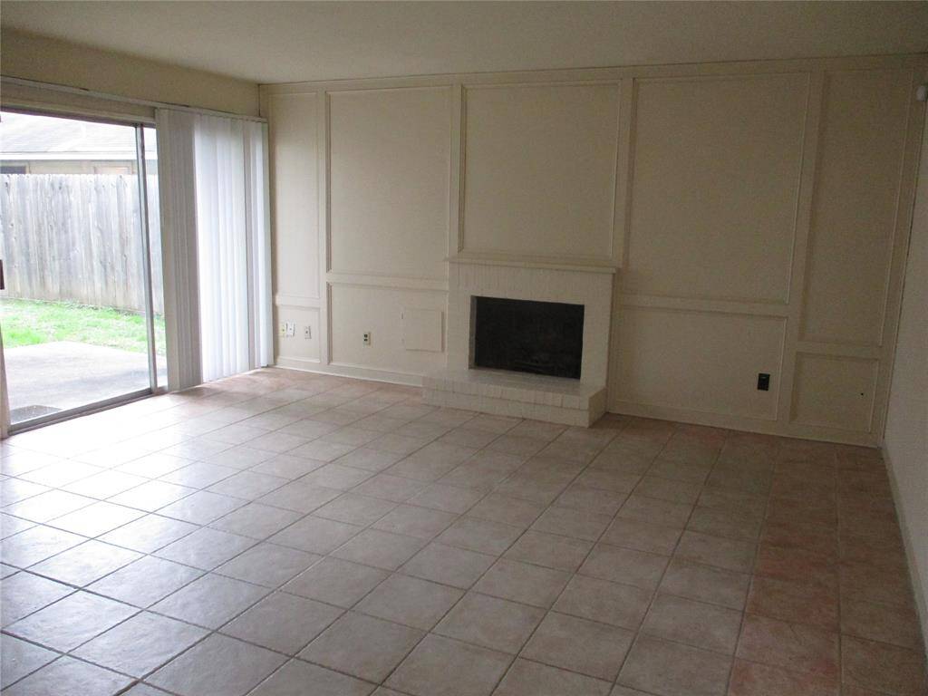 2023 painted walnut woodwork beside fireplace