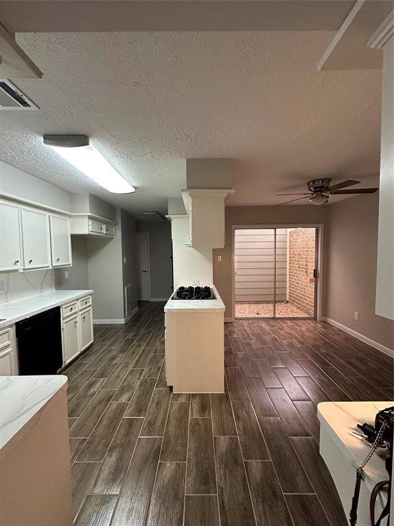 Kitchen/breakfast nook area. Earth tone tile newly installed.