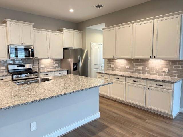Beautiful Kitchen overlooking Living Room-