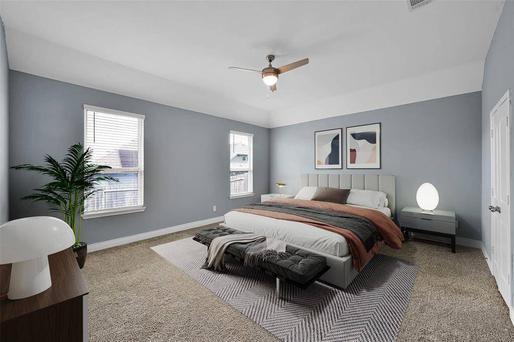 Primary Suite  is Virtually staged to show the scale of this generous space.