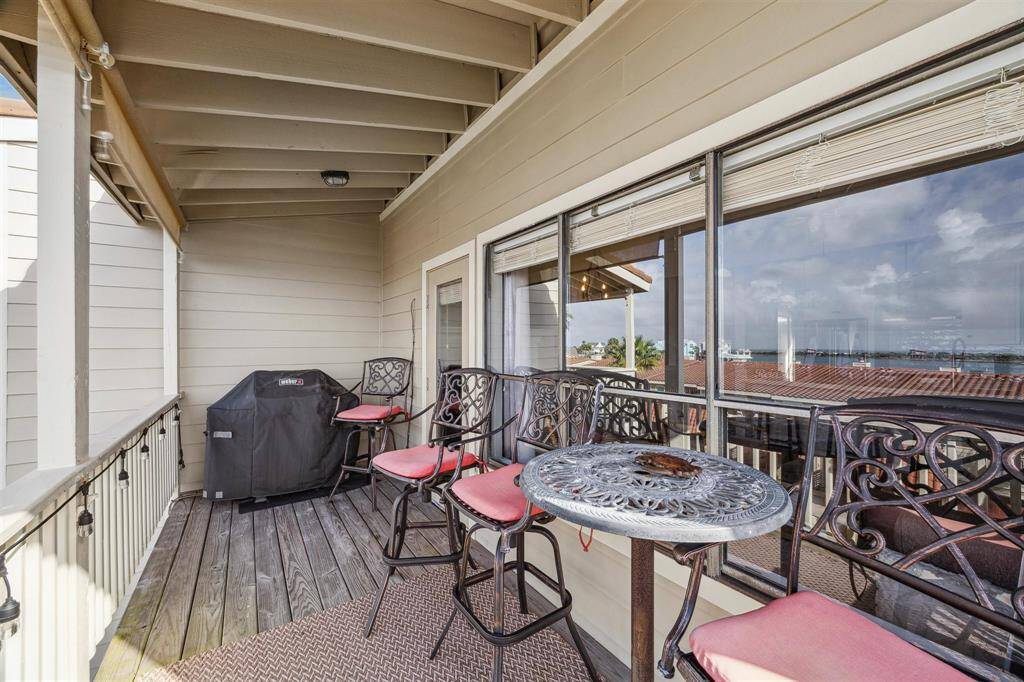 Enjoy seamless indoor-outdoor living with a spacious balcony accessible from the living room.