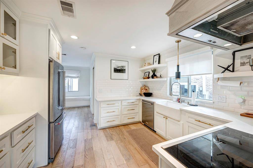 Custom glass cabinet add architectural interest.