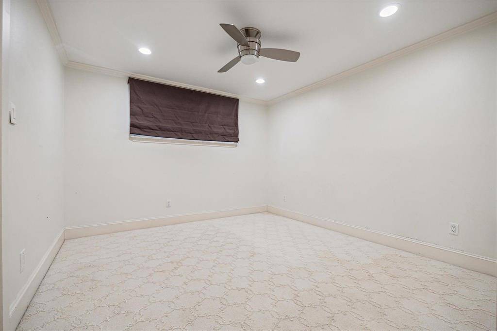 Bedroom with modern ceiling fan