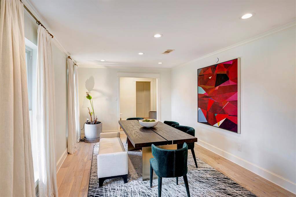 Dining towards entry and front windows.