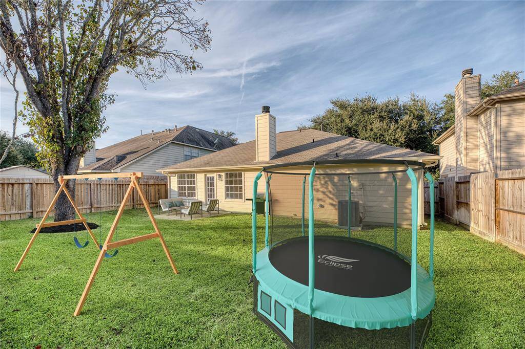 Expansive backyard perfect for recreation and relaxation.