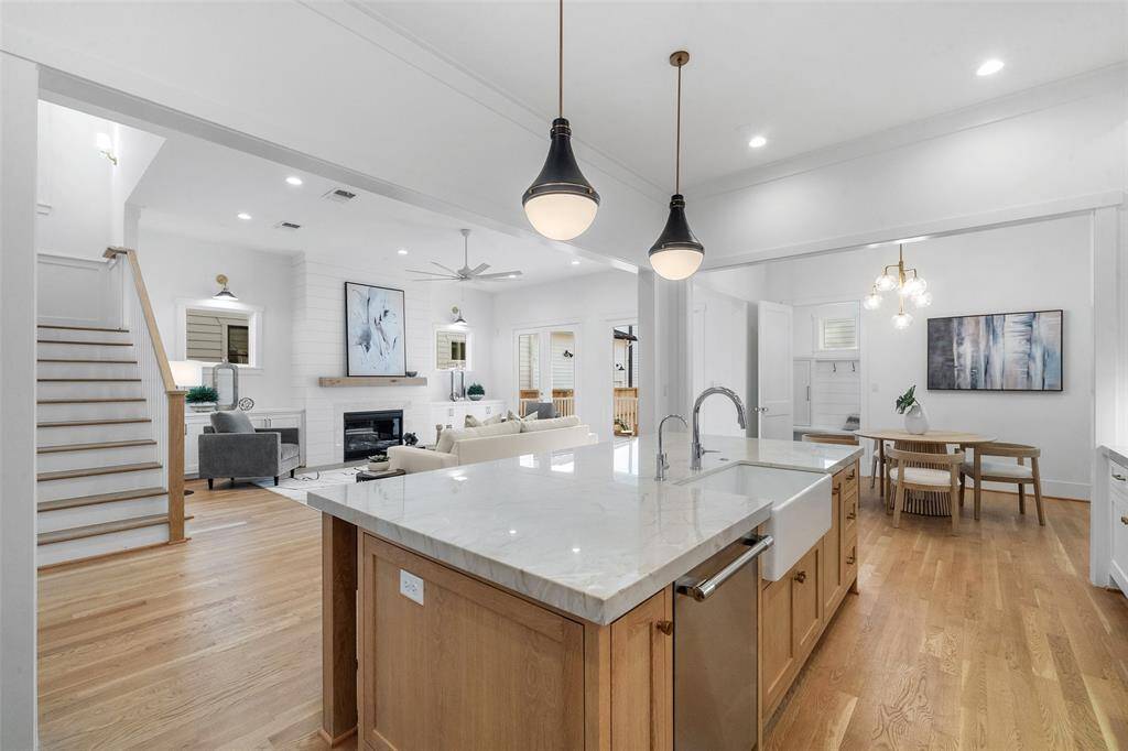 The Island is made of White oak with quartzite counter top.