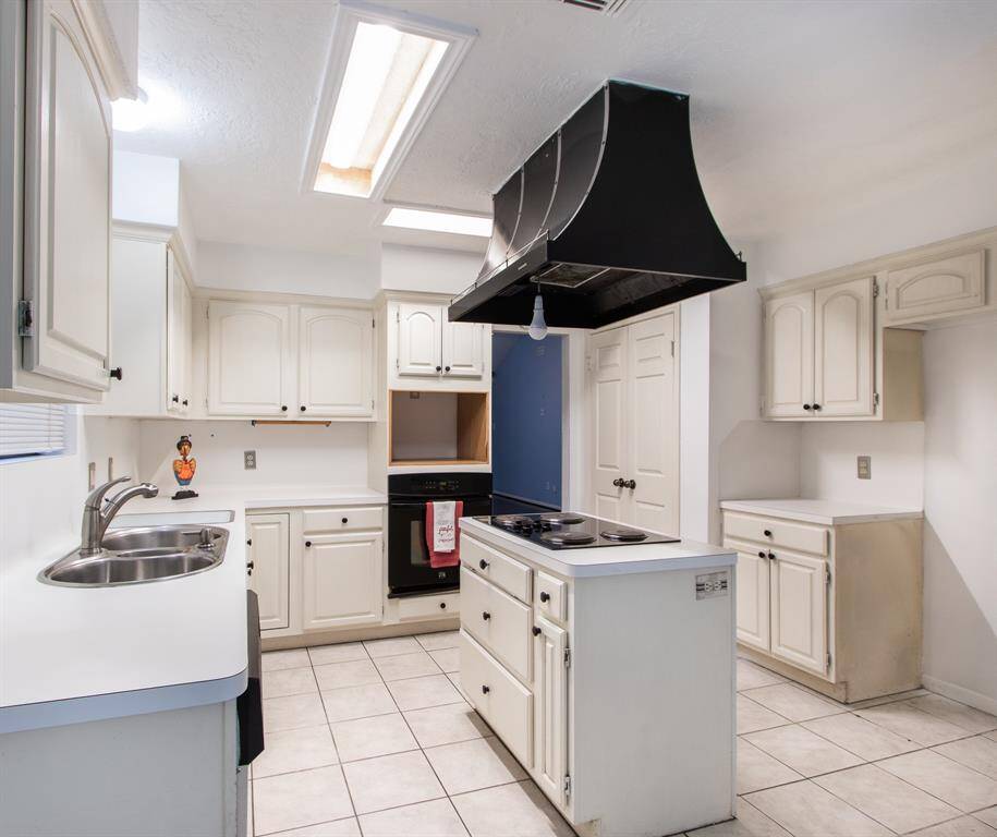 The spacious kitchen opens to the breakfast area and adjacent to the family room or combo family room w/formal dining area