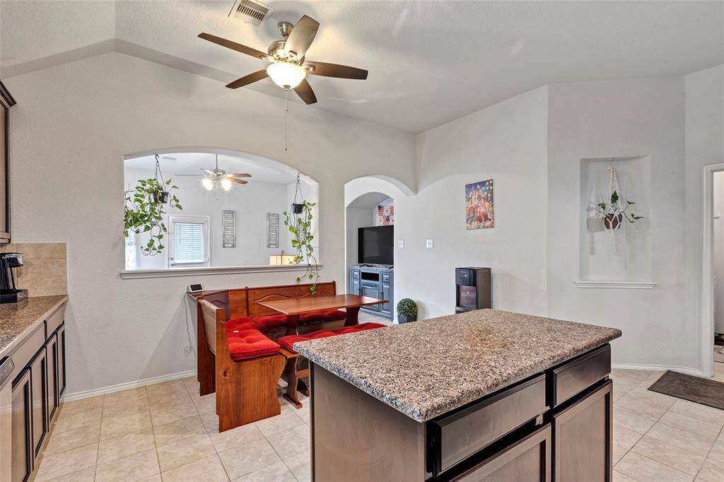 A view from the kitchen, looking out into the spacious and inviting living room.
