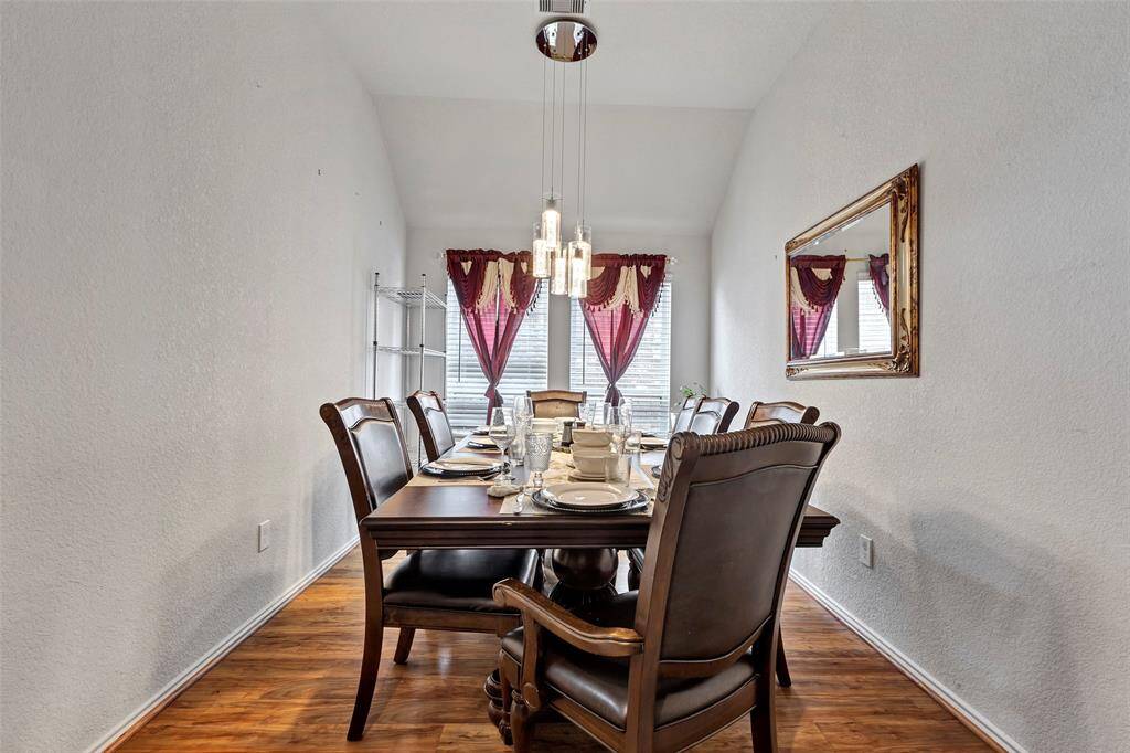 This room is beautifully illuminated by natural light streaming through the window creating a warm and inviting atmosphere.