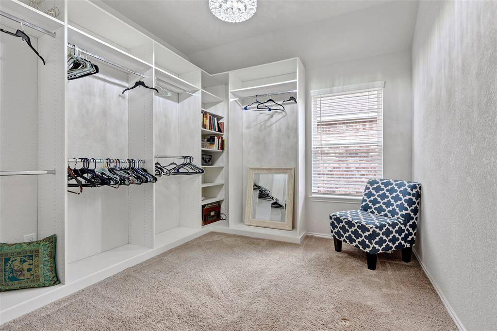 Use this room as a spacious walk-in closet or secondary bedroom.