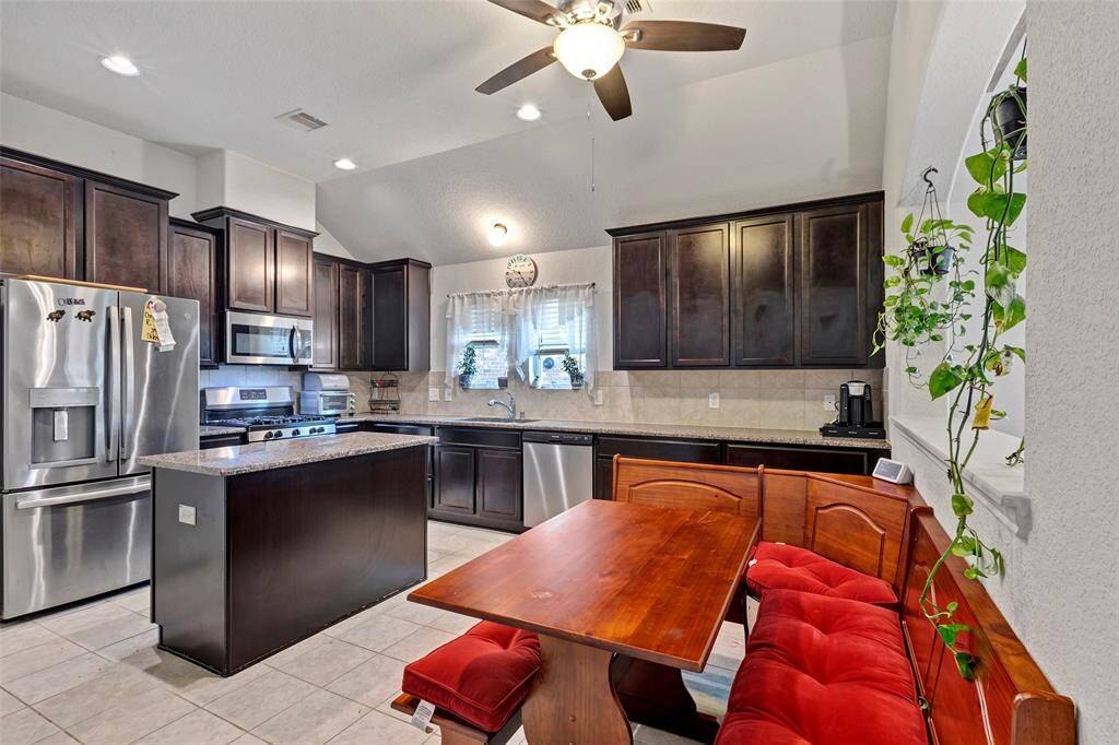With plenty of cabinetry for storage, this kitchen ensures all your essentials are neatly organized and easily accessible.