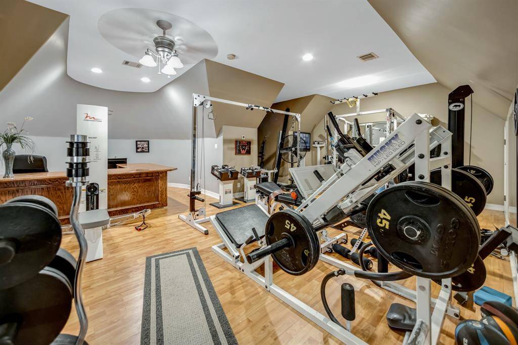 Second floor 39X14.3 enormous flex room with canister lights, wood flooring and 2 Polk built-in speakers. There is an additional 12X11 office area with built-in desk.