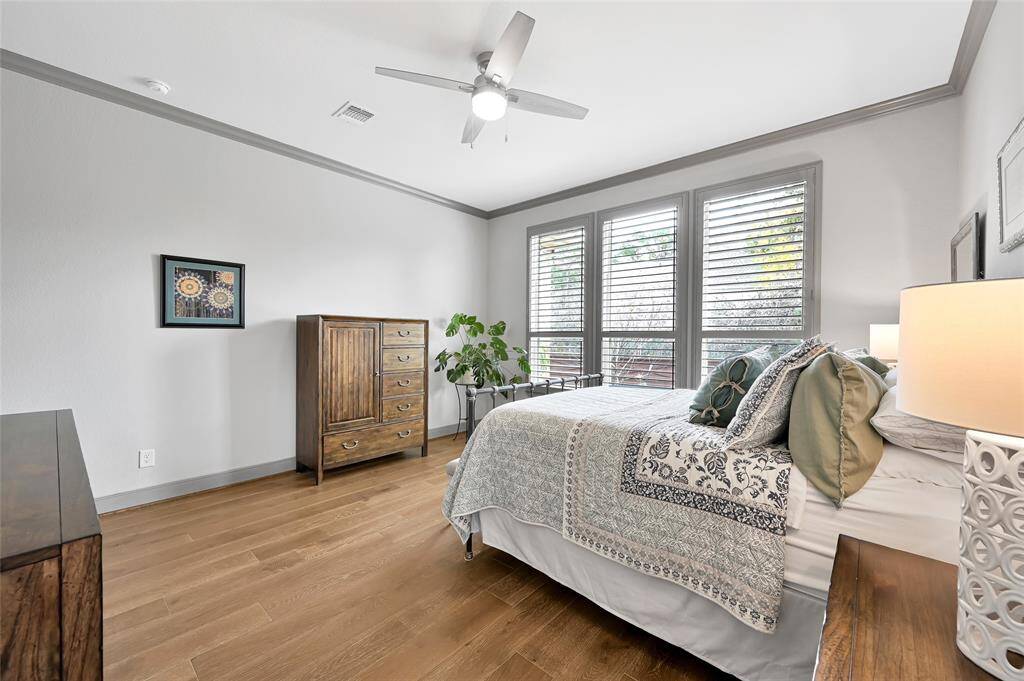 Crown molding and an continuation of the beautiful hardwood floors create a warm and relaxing space.