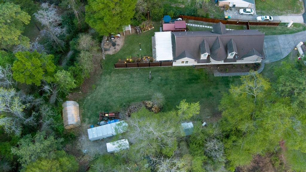 Sitting on approximately 3/4 Acre of land with easy access to I-45, Lake Conroe, extensive shopping and entertainment