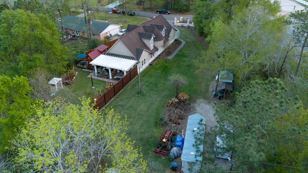 This property provides additional spaces for your RV's and boats with designated gravel parking area. Sellers added a 1,200 s/f pad with side entrance and parking pad