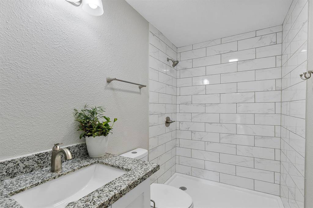 Secondary Bathroom also has a large walk-in shower