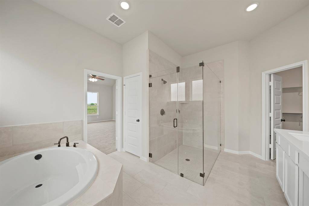Freestanding tub and shower in primary bath