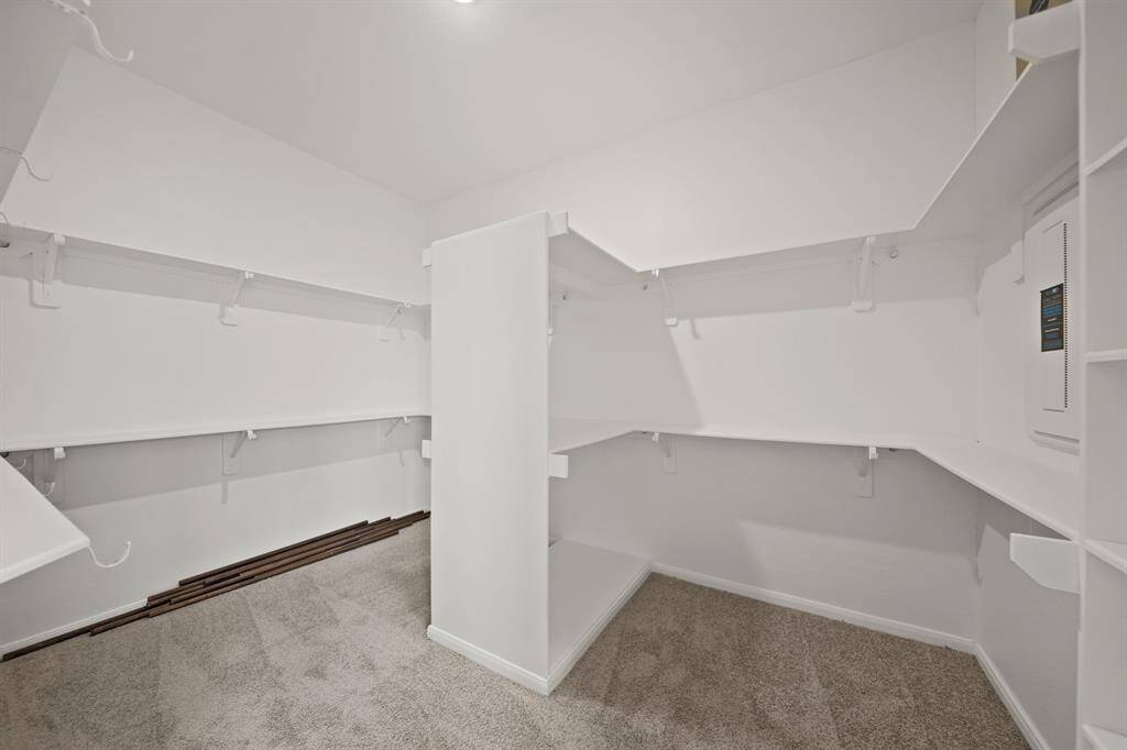 Walk-in closet in primary suite