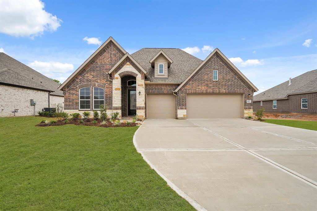 Charming Walden design by K. Hovnanian Homes in elevation E built in Tejas Landing.