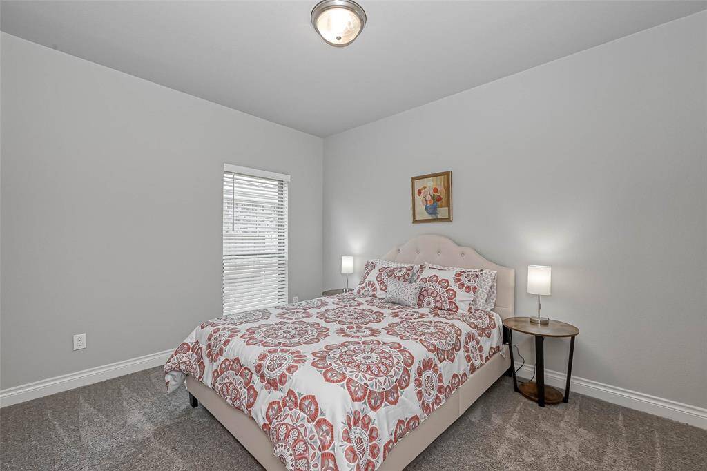 This home features 2 amazing guestrooms; each room offers plushcarpet, decorator paint,and a closet.