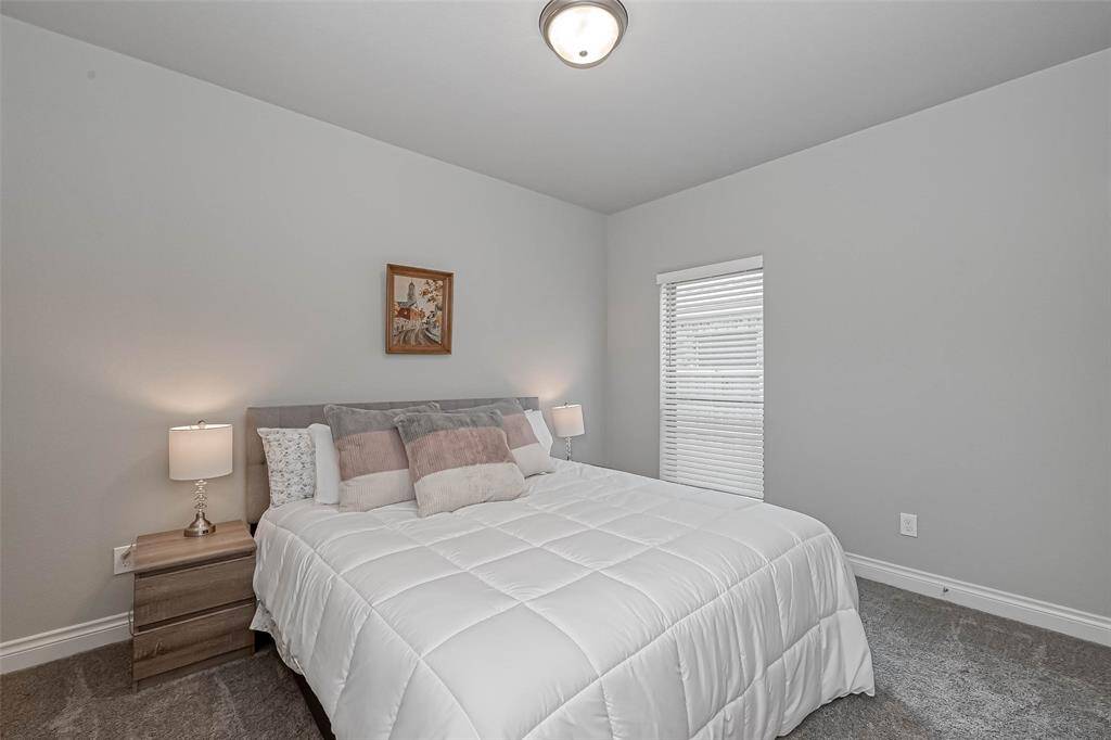 This home features 2 amazing guestrooms; each room offers plushcarpet, decorator paint,and a closet.