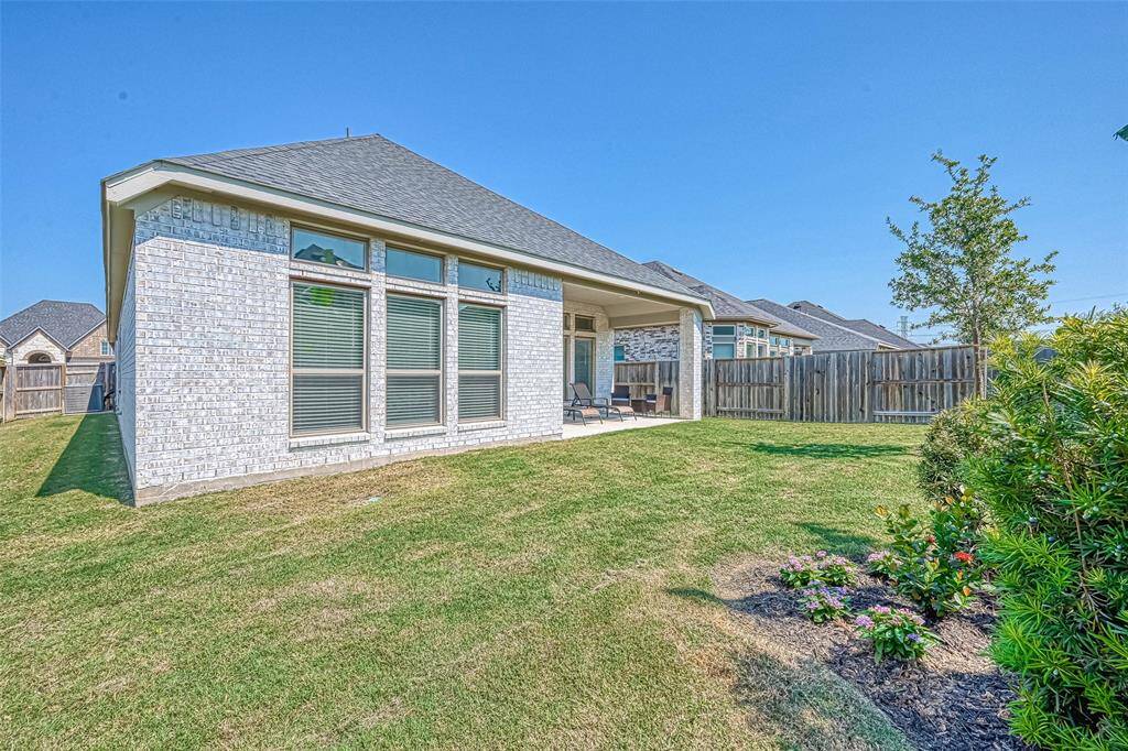 Take note of how the brick exterior extends on all four sides of the home!