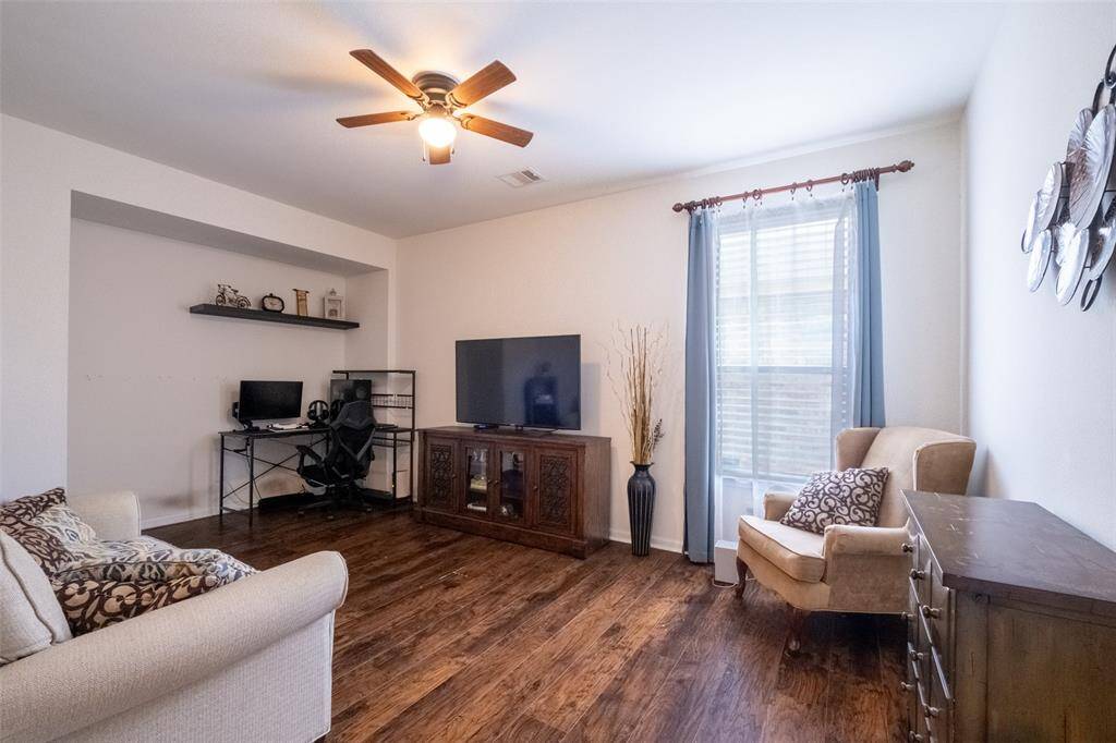 Office with ample natural light from the window.