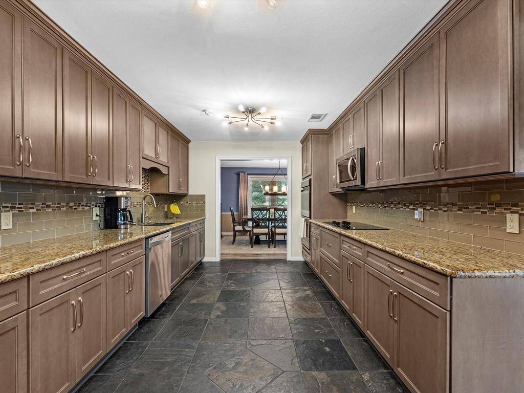 View of Kitchen and Formal Dining from Breakfast Area