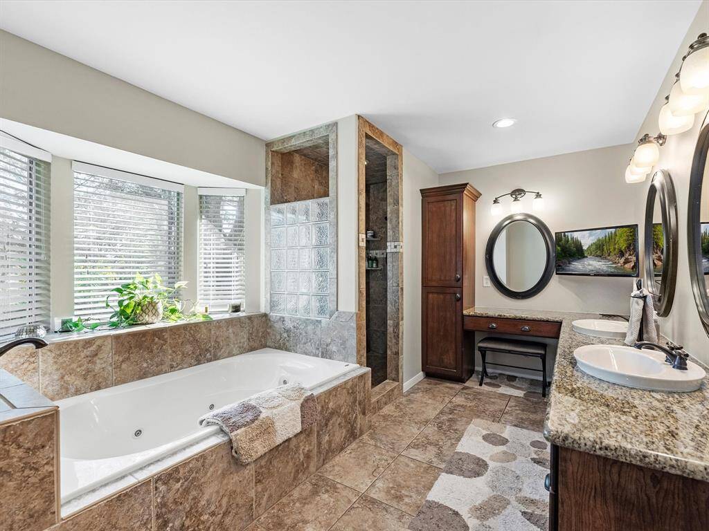 Main Primary Bathroom with jacuzzi/soaking tub and separate oversized walk-in shower