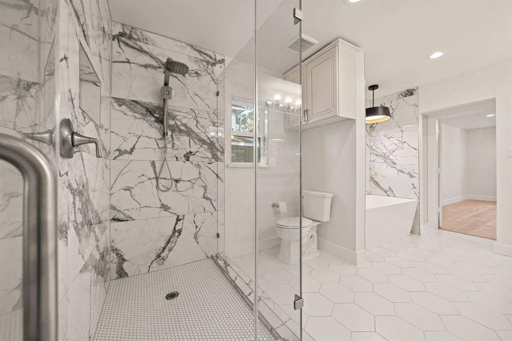 Enormous Marble Shower & Separate Soaking Tub